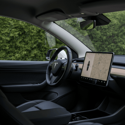Tesla Introduces Major Interior Upgrades to Premium Model Y Trims Including Larger Screen and Darker Aesthetic
