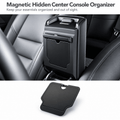 Magnetic hidden console organizer attached to the rear of a raised console lid, with its removable panel below