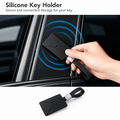 Black silicone key-card holder held against the door pillar, with a separate view of its wrist loop