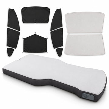 Complete sleep bundle on white: NovaPads mattress, two beige roof shade panels and eight black shades for front, rear and side glass