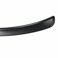 Close-up of the curved end and raised edge of a black wheel arch protector