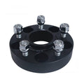 Angled view of a black TESERY forged wheel spacer for Tesla, showing the center opening and silver nuts.
